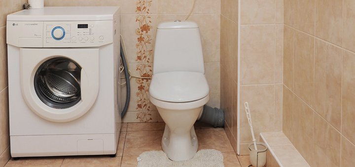 Washing machine in a two-room suite &quot;wellcome24&quot; in kiev on levoberezhna. shoot for the action.