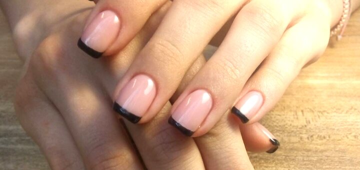 On stock french manicure in the beautiful silk nails beauty studio