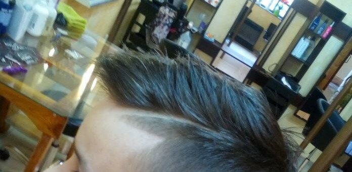 Children&#39;s hairstyle in the beauty salon beauty factory &amp; coffee house slavyansk