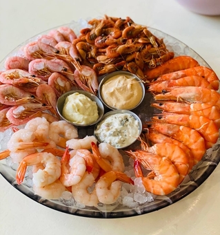 Plate of seafood on site and delivery