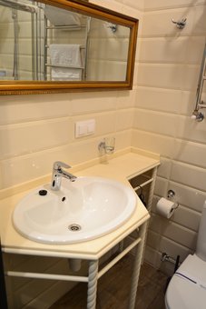 Bathroom in the room of the Michel hotel in Odessa. Reserve a room for the promotion.