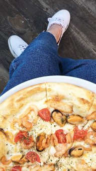 Pizza at the staker&#39;s restaurant in dnipro. order at a special price