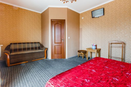 Standard room 2-bed room with a balcony near the Everest motel Ivano-Frankivskiy. Book a room with a book